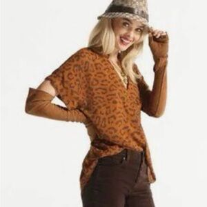 Cabi item #4345 Replay Top Leopard Print short sleeve blouse. New with tags.